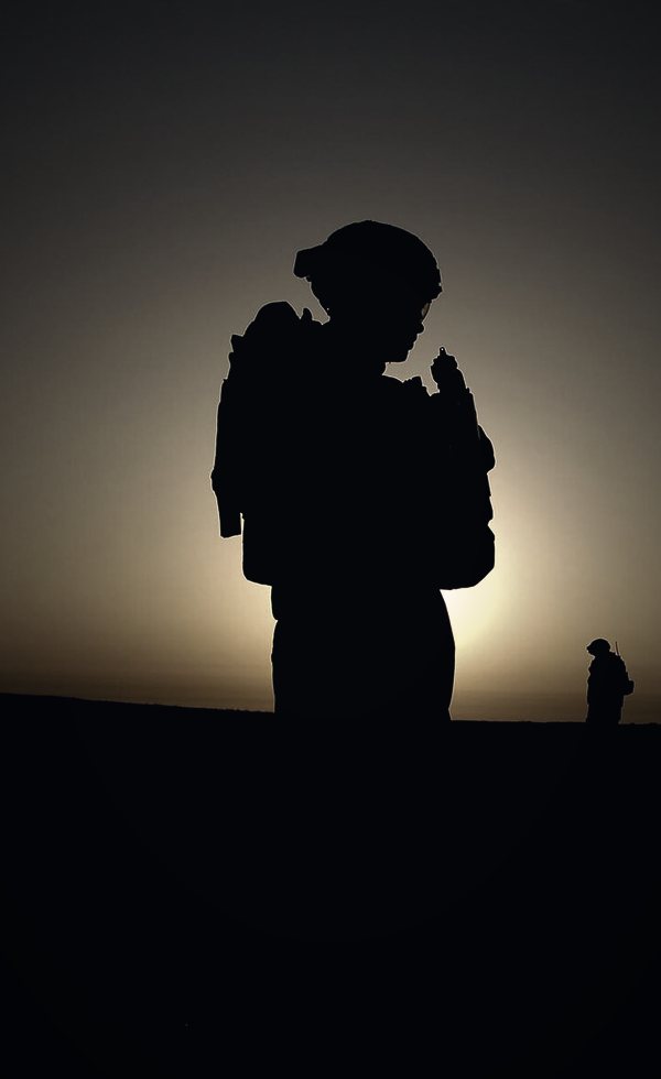 Silhouette of a soldier against the sunset